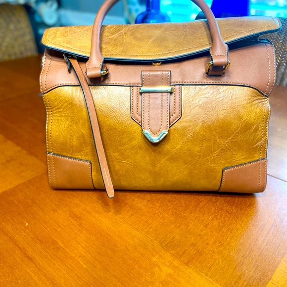Brown duffle purse. No name leopard inside lining. - Picture 3 of 7